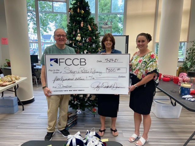 FCCB presents Sayre Public Library with donation